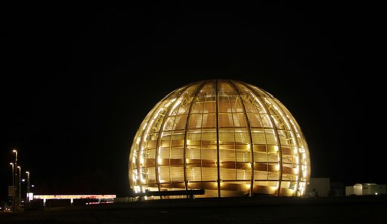 FILE - In this  Tuesday, March 30, 2010 file photo, the globe of the European Organization for Nuclear Research, CERN, is illuminated outside Geneva, Switzerland. Scientists at CERN, the world's largest physics lab, say they have clocked subatomic particles, called neutrinos, traveling faster than light, a feat that, if true, would break a fundamental pillar of science, the idea that nothing is supposed to move faster than light, at least according to Albert Einstein's special theory of relativity: The famous E (equals) mc2 equation. That stands for energy equals mass times the speed of light squared. The readings have so astounded researchers that they are asking others to independently verify the measurements before claiming an actual discovery. (AP Photo/Anja Niedringhaus)